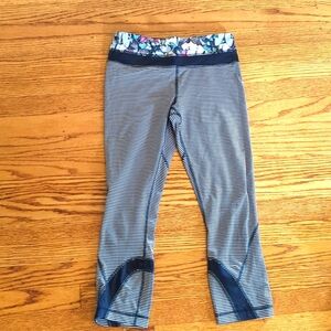 Lululemon pink and black stripe butterfly Capri leggings